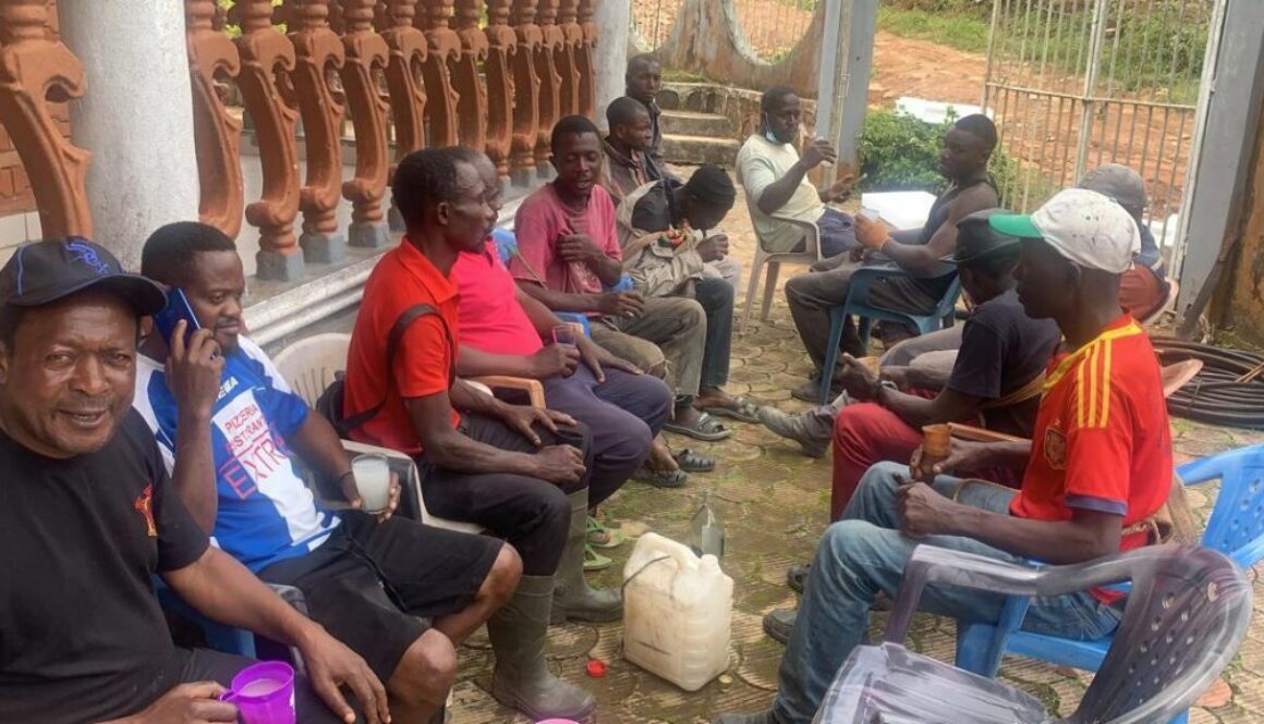Lord Mayor Ubangoh relaxes with some men of his quarter, in Andek, after Monday community work of 16th June 2025.