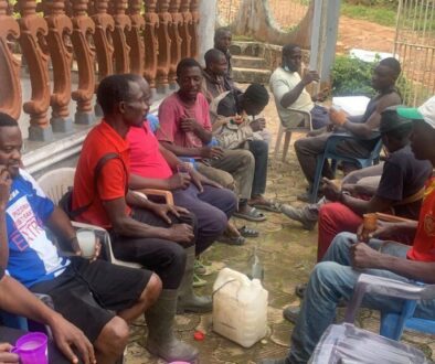 Lord Mayor Ubangoh relaxes with some men of his quarter, in Andek, after Monday community work of 16th June 2025.