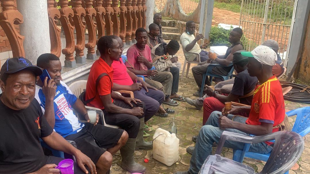 Lord Mayor Ubangoh relaxes with some men of his quarter, in Andek, after Monday community work of 16th June 2025.